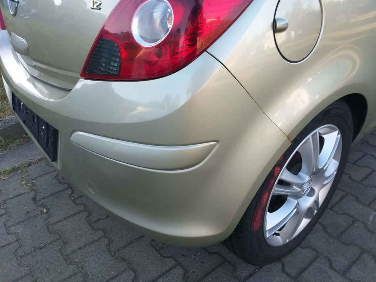 Opel Corsa D original Stoßstange Stossfänger hinten Champagnersilber Z40M 3-Türer Bj.2007